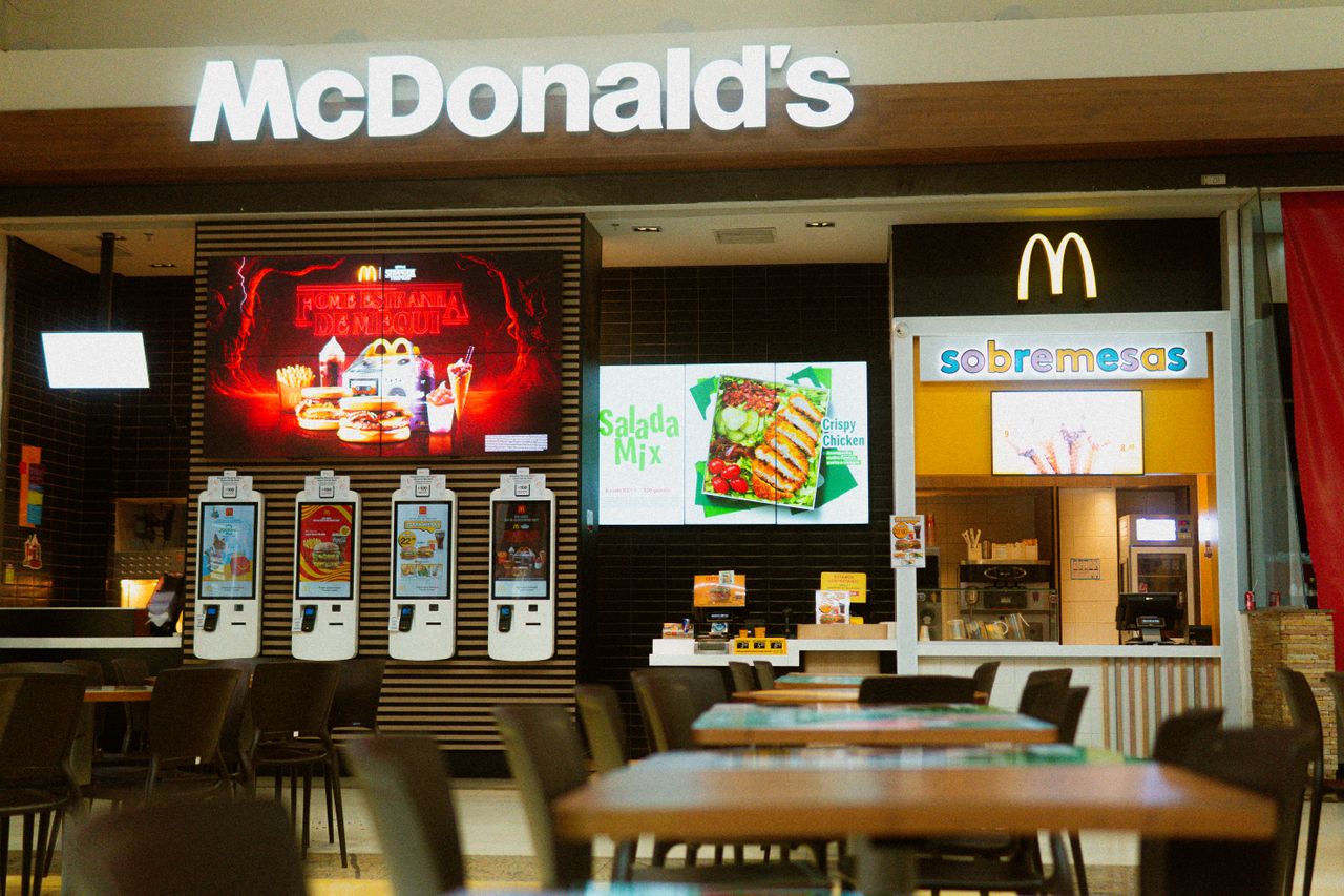 gallery-3 McDonald's fast food restaurant featuring self-service kiosks and digital menus.